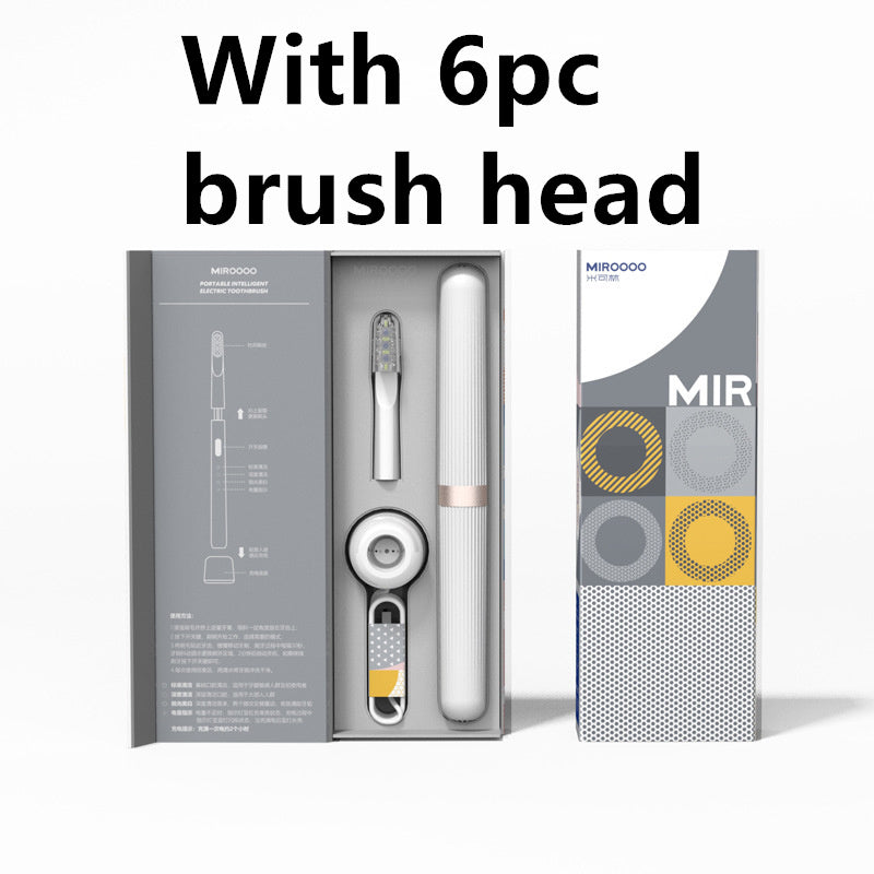 Dark-gray toothbrush package labeled for six-brush-head option