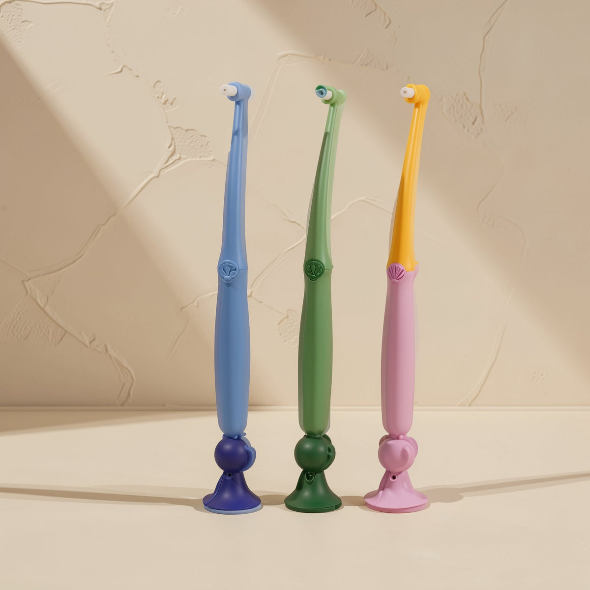 Interdental cleaning brush with a small head, soft bristles, and suction cup