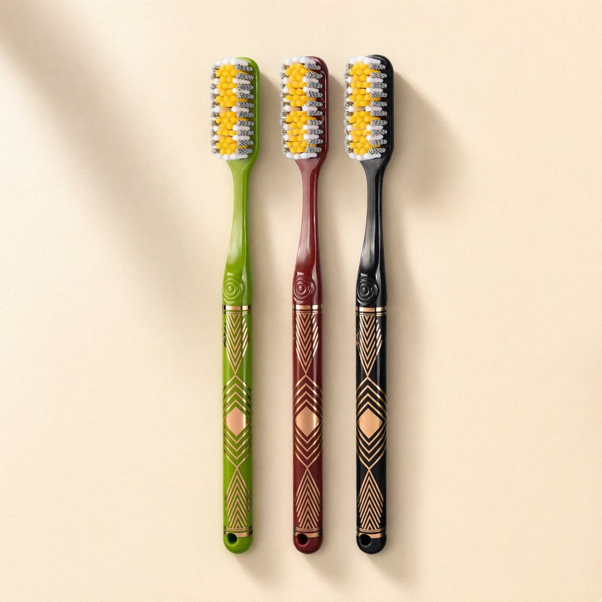 Six adult manual toothbrushes with medium-hard bristles and extended heads arranged beside a gift box - view 5