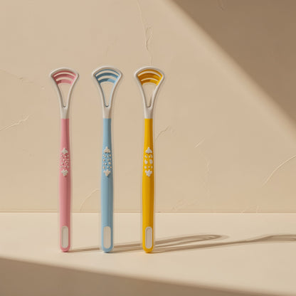 Silicone tongue cleaner with a brush and scraper for cleaning tongue coating