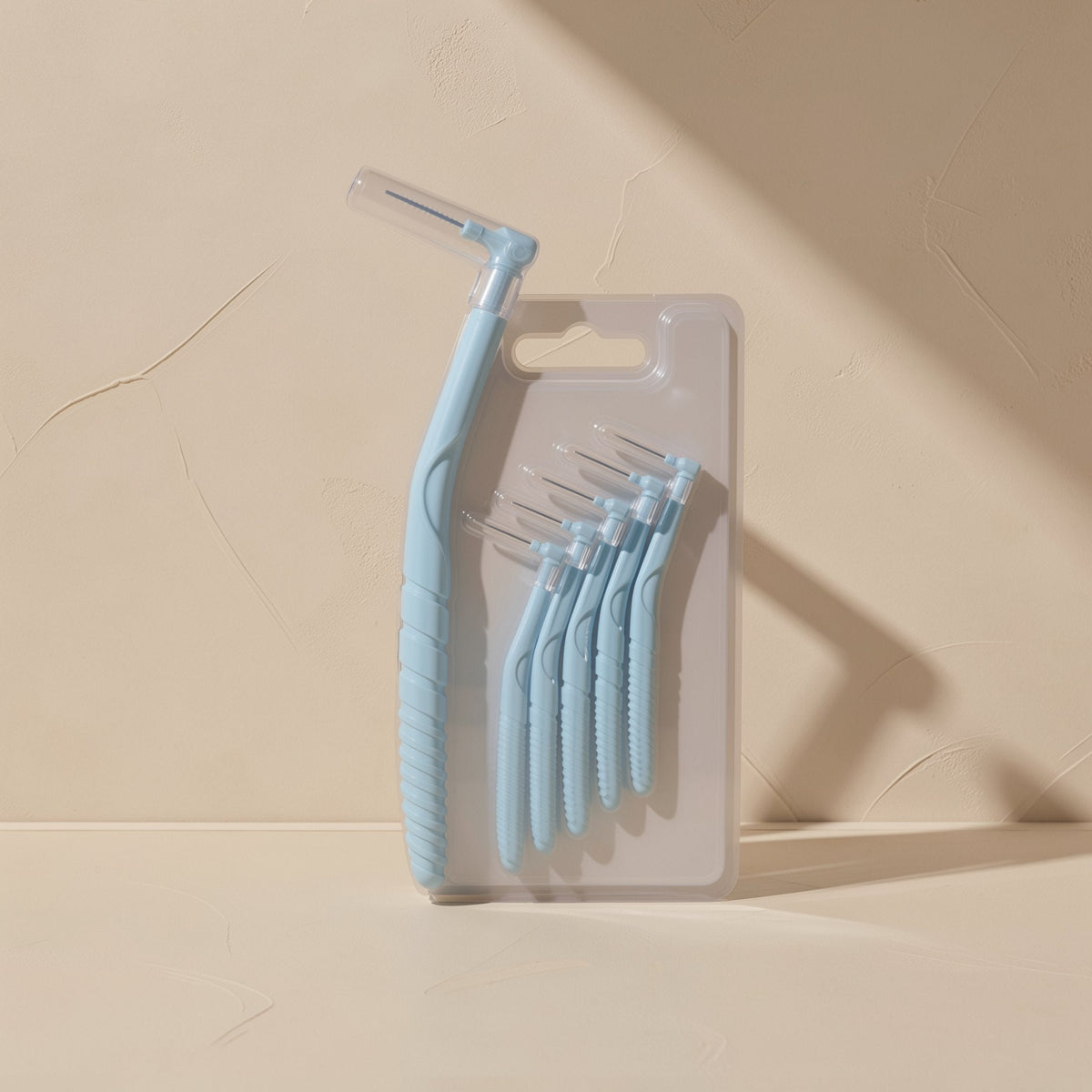 L-shaped interdental brush with a small head and ultra-fine, soft bristles