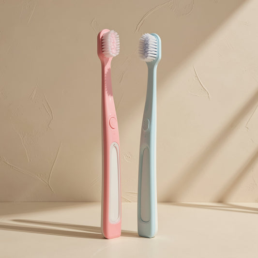 U-shaped manual orthodontic toothbrush with soft fluoride-containing bristles and a small brush head