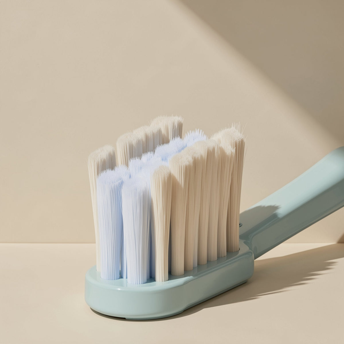 U-shaped manual orthodontic toothbrush with soft fluoride-containing bristles and a small brush head - view 3