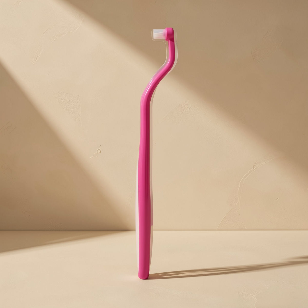 Adult manual toothbrush with a small head and tapered single-tuft bristles - view 3