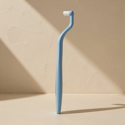 Adult manual toothbrush with a small head and tapered single-tuft bristles - view 4