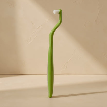 Adult manual toothbrush with a small head and tapered single-tuft bristles - view 5