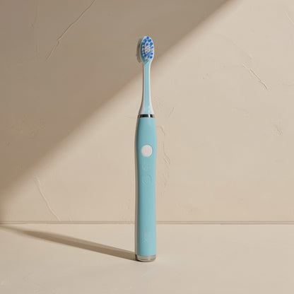 Manual orthodontic toothbrush with a small U-shaped head and soft fluoride-containing bristles - view 3