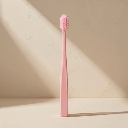 Manual orthodontic toothbrush with a small U-shaped head and soft fluoride-containing bristles - view 5