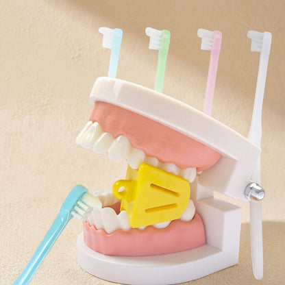 Manual toothbrush with a small head, soft bristles, and a single-tuft design - view 5