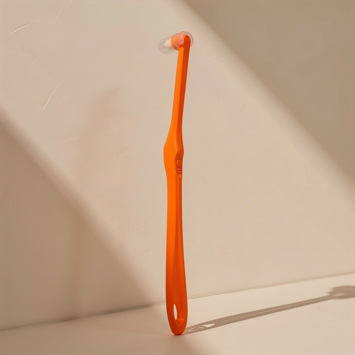 Manual toothbrush with a small tapered single-tuft head and soft bristles - view 5