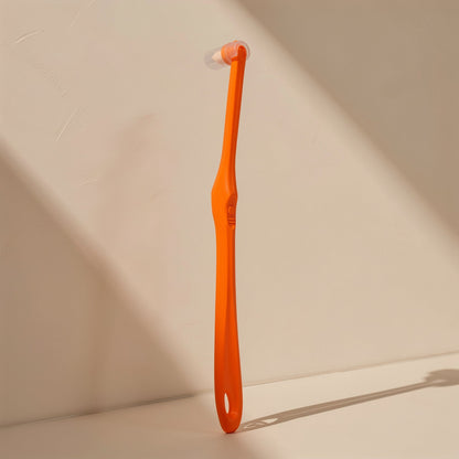 Manual toothbrush with a small tapered single-tuft head and soft bristles - view 5