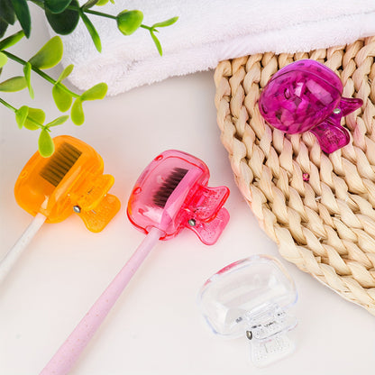 Colored clip-on head covers displayed with toothbrushes and towels