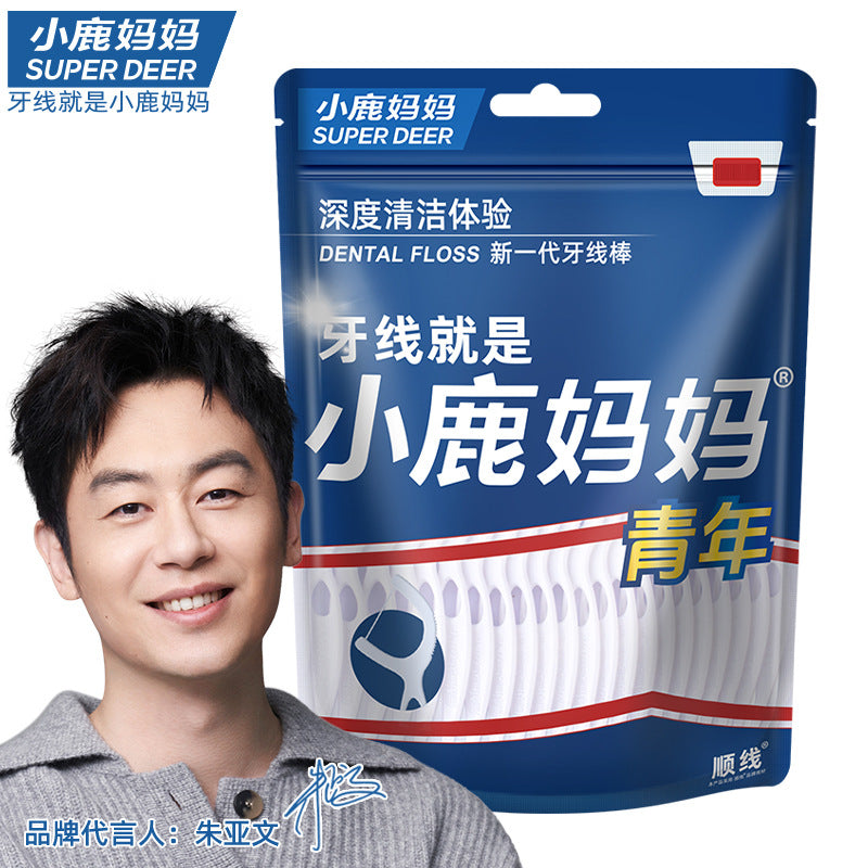 Blue Super Deer floss pick pouch shown with a smiling man in a grey shirt beside the packaging