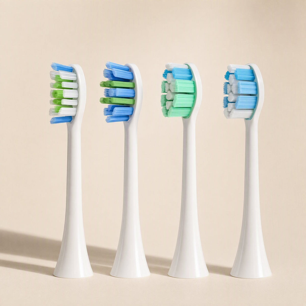 White electric toothbrush replacement brush head with soft bristles