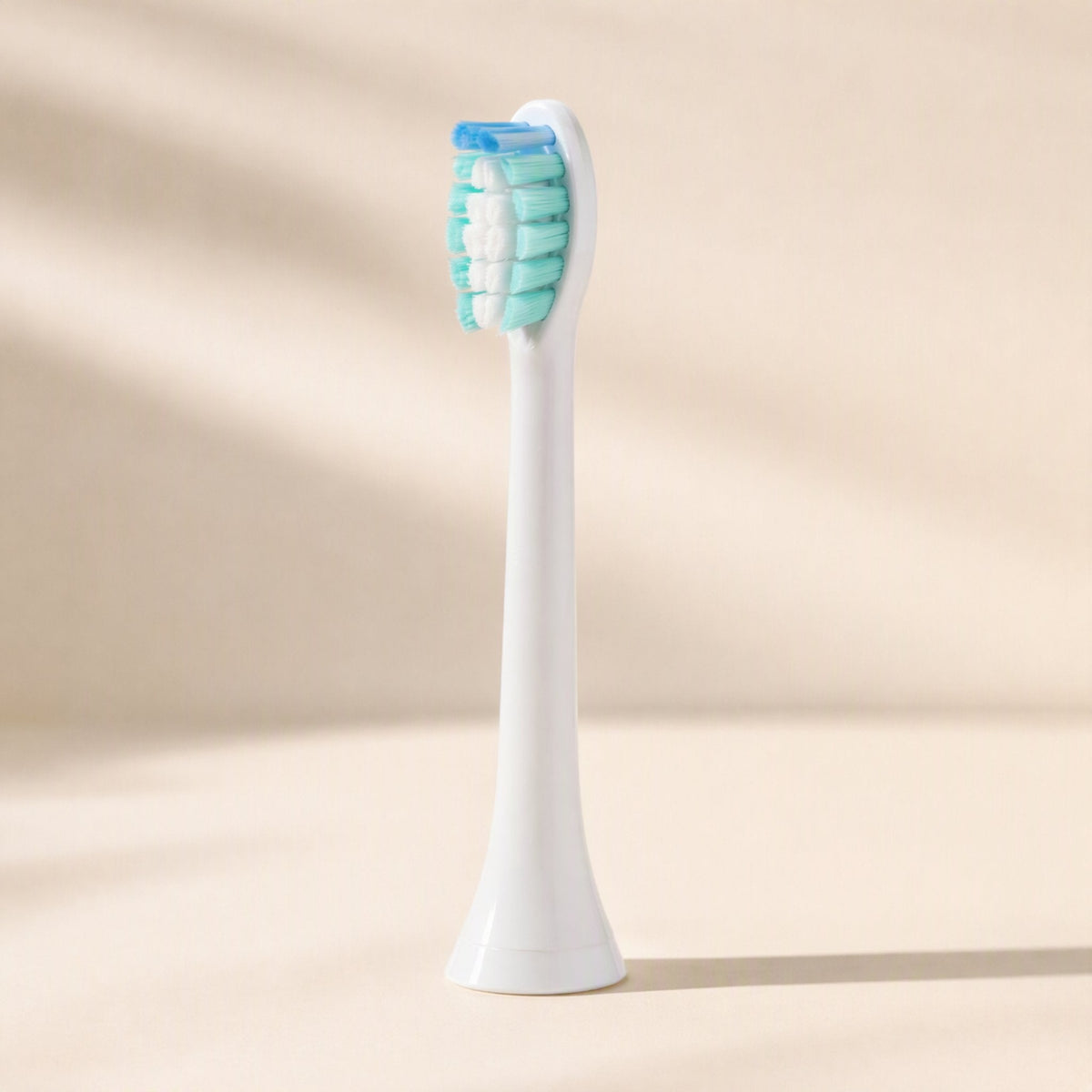 White electric toothbrush replacement brush head with soft bristles - view 2
