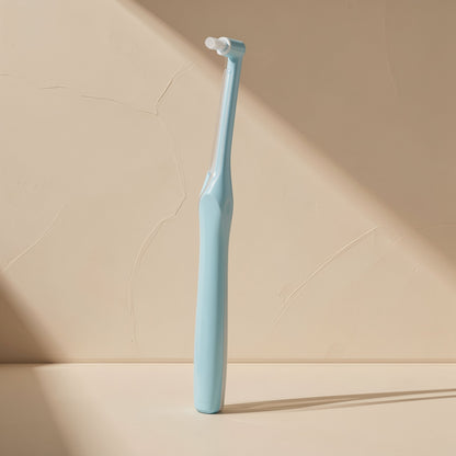 Manual single-head orthodontic toothbrush with pointed soft bristles and a single hole - view 4