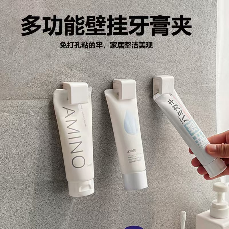 Toothpaste Holder Wall-Mounted Punch-Free Facial Cleanser Storage Rack Bathroom Toilet Storage Wall Hook Toothpaste Hanging Clip Cross-Border - image 1