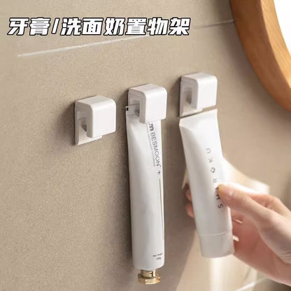Toothpaste Holder Wall-Mounted Punch-Free Facial Cleanser Storage Rack Bathroom Toilet Storage Wall Hook Toothpaste Hanging Clip Cross-Border - image 3