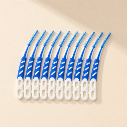 Boxed set of 12 plastic interdental brushes for oral cleaning between teeth