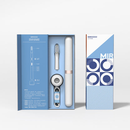 Silver toothbrush with charging base and case in blue original supplier packaging