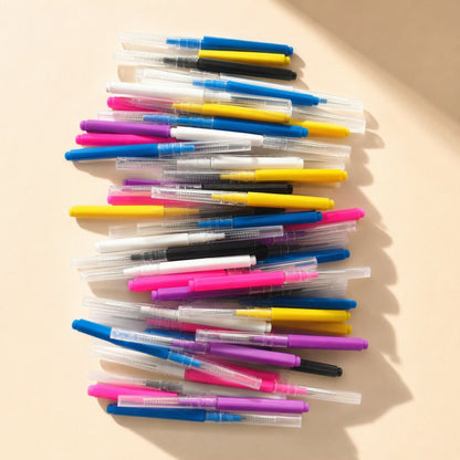A 100-pack of capped interdental brushes with soft bristles