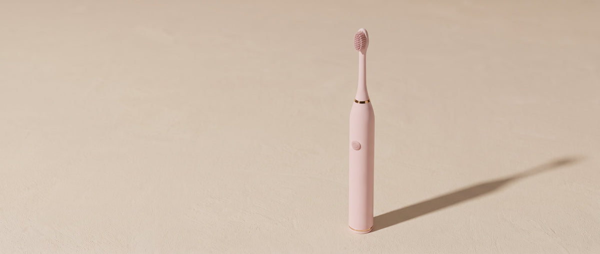 Pink OralCove electric toothbrush